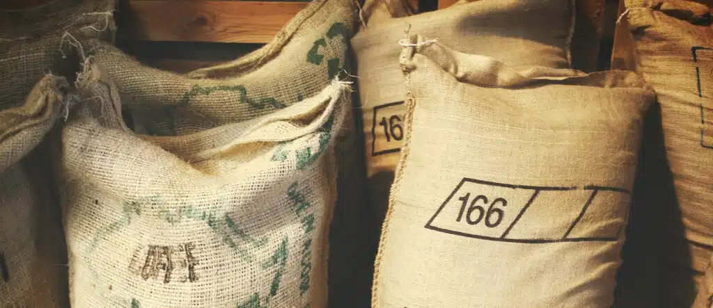 Bags of coffee beans, representing a variety of coffee flavors.