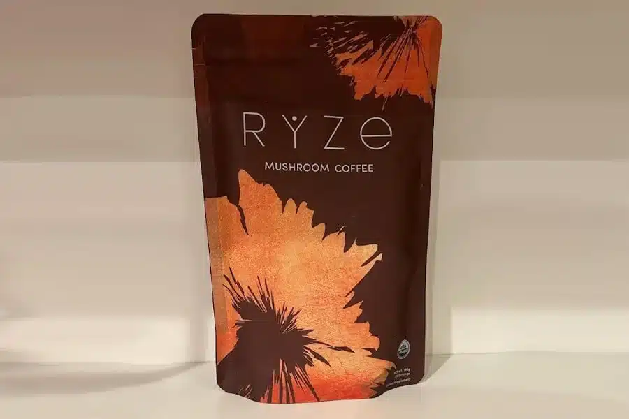Ryze Mushroom Coffee packaging featuring a  package with a clean, minimalist design showcasing the Ryze logo and branding