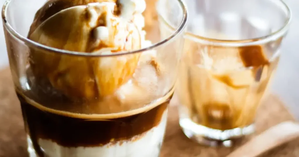 Affogato Coffee - Perfect Blend of Espresso & Ice Cream ☕🍨 4 An affogato coffee showing scoops of vanilla ice cream topped with hot espresso.