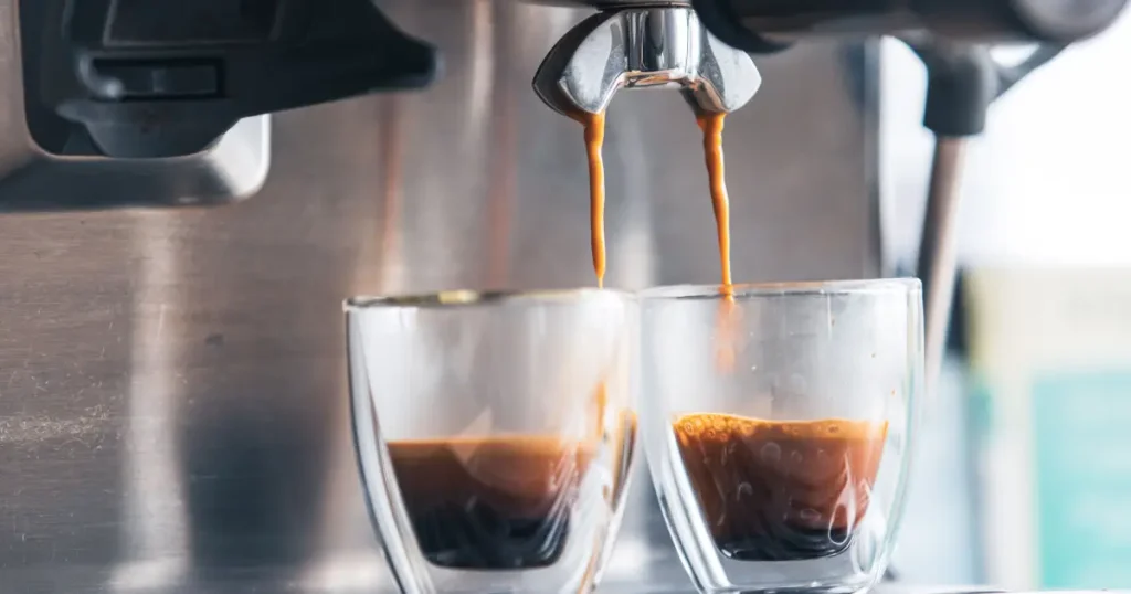 Perfect Espresso Shot - Step by Step Guide for Home Baristas 4 Two single shots of espresso being poured showing how the perfect espresso shot is brewed and made