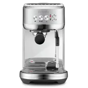 Breville Bambino Plus Espresso Machine Review Breville Bambino Plus espresso machine in a modern kitchen setup, showing its compact design and features.