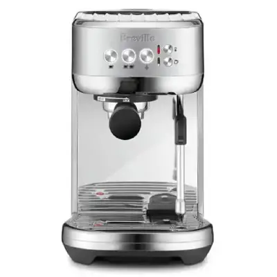 Breville Bambino Plus Espresso Machine Review Breville Bambino Plus espresso machine in a modern kitchen setup, showing its compact design and features.