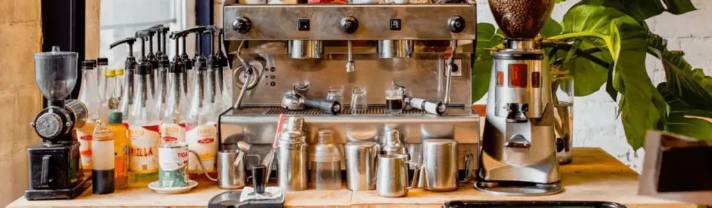 Home Coffee Station Setup for Barista-Style Brewing Stylish home coffee station with espresso machine, grinder, and organized accessories