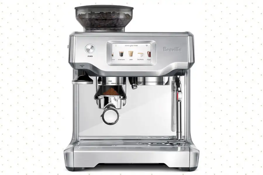 Breville Barista Touch espresso machine with a sleek touchscreen interface, displayed in a modern kitchen setting.