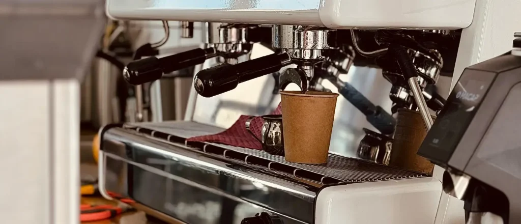 Fully Automatic Espresso Machines - Ultimate Convenience ☕ 73 Barista operates fully automatic espresso machines, demonstrating ease and convenience