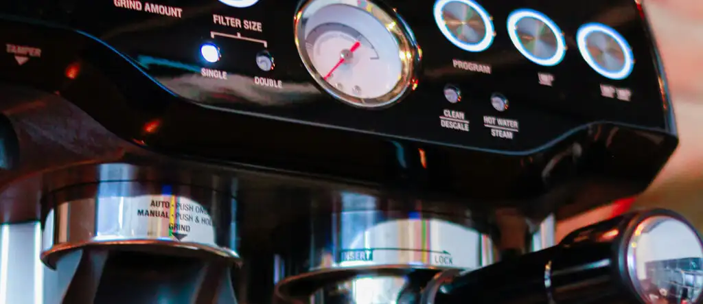 Modern fully-automatic espresso machine with integrated milk frother and touch screen controls