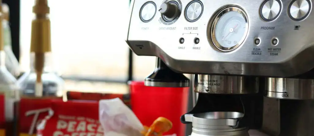 Modern fully-automatic espresso machine with sleek design and advanced brewing features