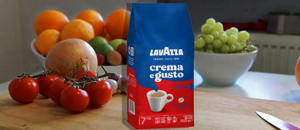 Lavazza Crema E Gusto coffee package displayed on a kitchen bench, showcasing its rich, full-bodied flavor and perfect for espresso drinks