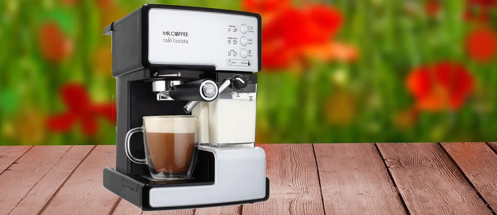 Mr. Coffee Café Barista Espresso Machine placed on a kitchen bench with a sleek, compact design and built-in milk frother