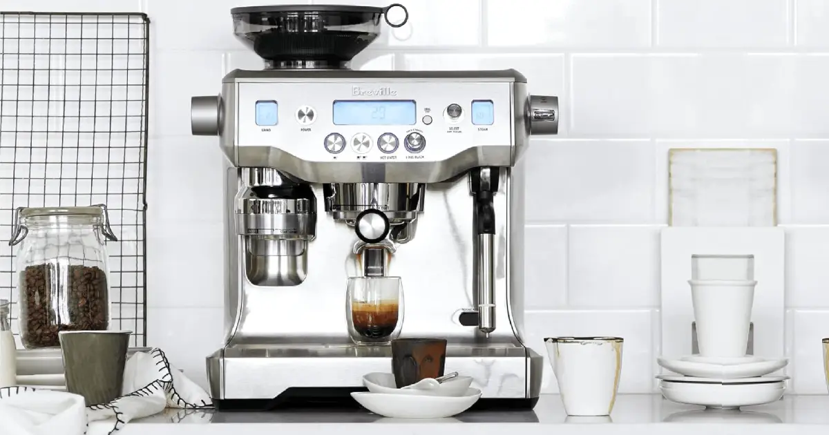 Breville Oracle Review: Is This the Ultimate Home Espresso Machine? 2 Breville Oracle espresso machine on a modern kitchen countertop with integrated grinder and steam wand