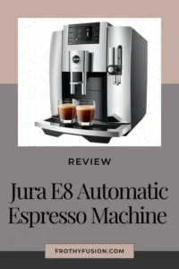 Jura E8 Review: Premium Coffee Shop Quality at Home? 3 Partial side view of the Jura E8 Automatic Espresso Machine, highlighting its sleek design, chrome accents, and user-friendly interface.