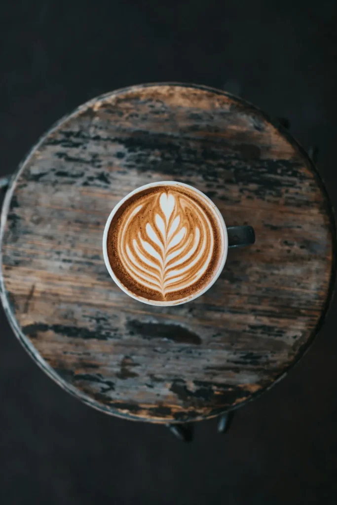 A beautifully crafted Rosetta latte art in a cup of coffee, demonstrating beginner-friendly techniques for creating stunning designs.