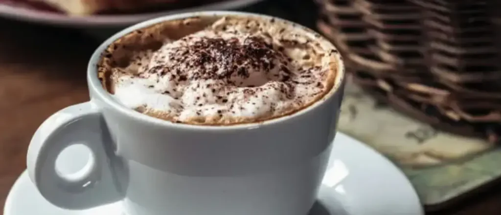 Cappuccino: Everything You Need to Know About This Classic Drink ☕✨ 33 A creamy cappuccino in a cup, topped with rich milk foam and served fresh — perfect for busy mornings
