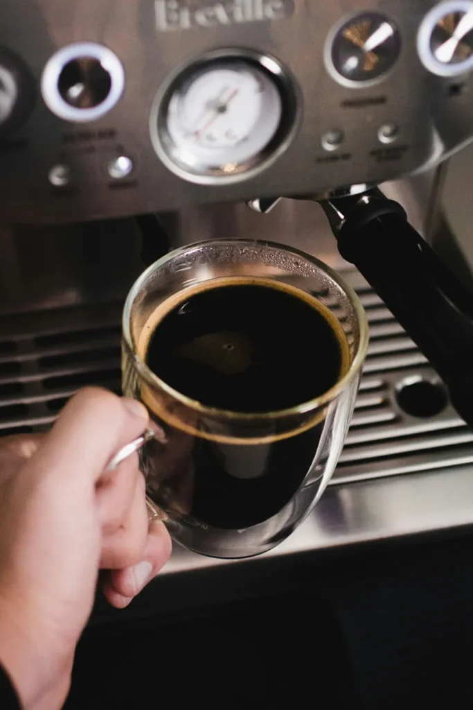 A cup of Americano coffee, representing its rich history and origins as an espresso-based beverage.