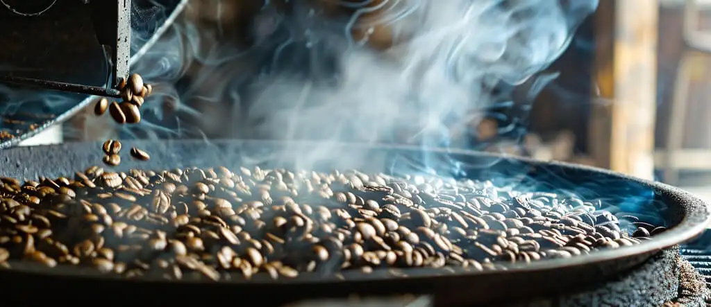 Close-up of freshly roasted single origin coffee beans, highlighting their rich aroma, deep brown color, and smooth, oily surface.