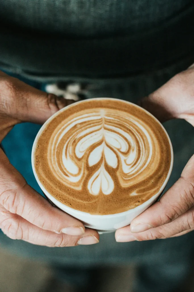 Close-up of tulip latte art on a freshly brewed coffee