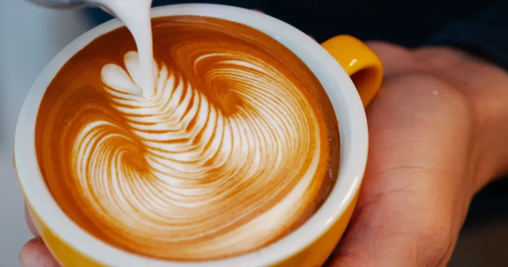 Best Latte Art Tools (2026 Buyer's Guide)☕🎨 4 A beautiful rosetta design created with the best latte art tools and perfectly steamed milk — showcasing the artistry behind every great latte.