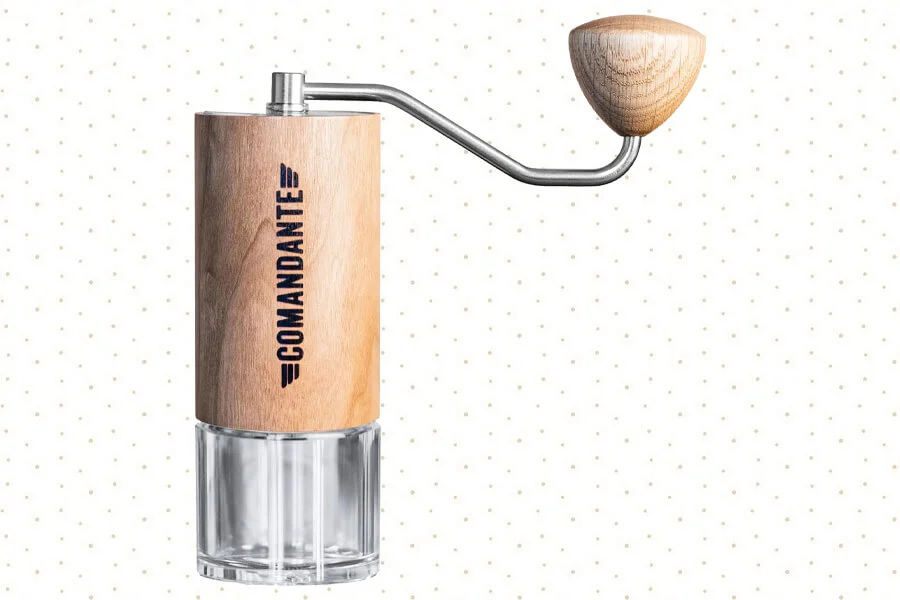 Comandante Coffee Grinder C40 MK4 Liquid Amber manual coffee grinder with high-nitrogen steel burrs and a premium wooden finish.