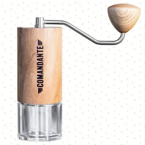Comandante Grinder Review Pinterest Pin Pinterest pin featuring a Comandante C40 hand coffee grinder beside coffee beans and pour-over equipment with text reading "Comandante Grinder Review – Is This Premium Hand Grinder Worth It?"
