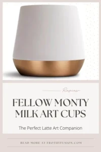 Fellow Monty Cups Review 3 Fellow Monty Milk Art Cup in matte white with a copper base, perfect for latte art and heat retention, displayed stylishly in a coffee setup.