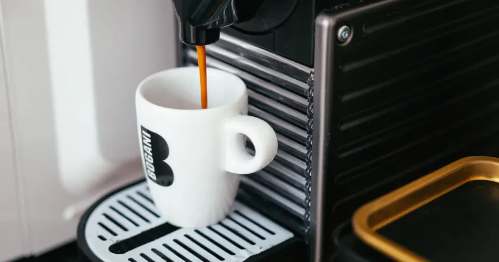 Nespresso Essenza Mini Review (2026): Is It Still Worth Buying? 5 nespresso coffee pour