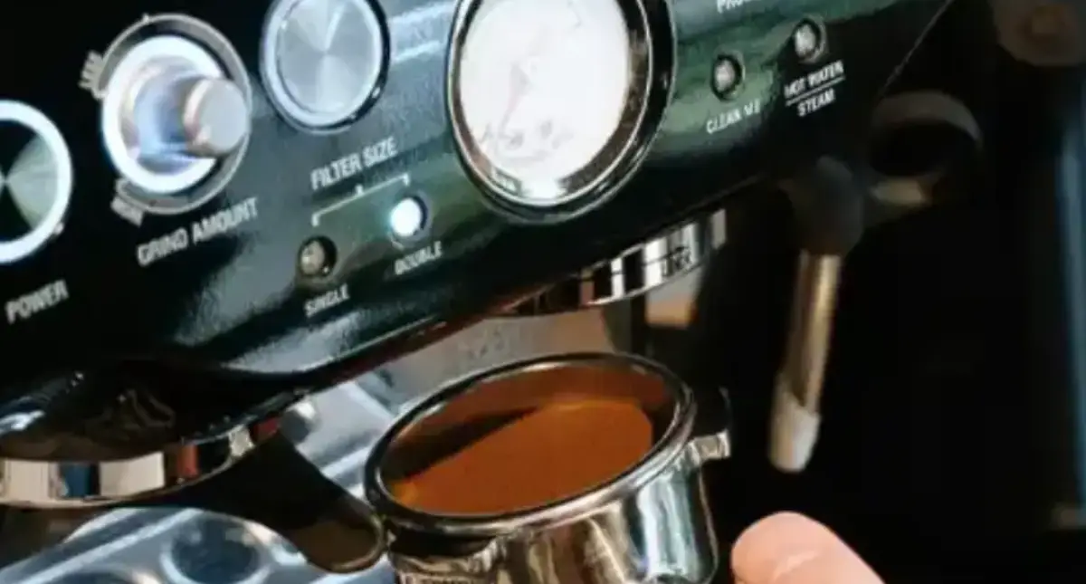 Best Single Boiler Espresso Machine for Beginners ☕ 2 Person operating a single boiler espresso machine, ideal for beginners learning home espresso brewing