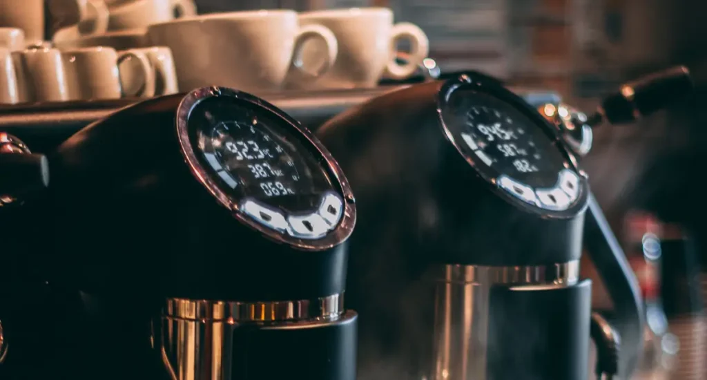 What Is a PID Espresso Machine (And Do You Need One?) 🌡️ 3 Close-up of a double boiler PID Espresso Machine steam wand and grouphead