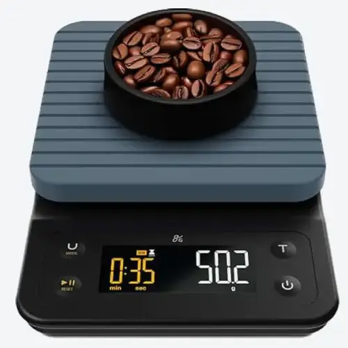 Greater Goods Coffee Scale – Affordable Precision for Everyday Brewing Greater Goods digital coffee scale with bright LCD screen and timer on a brewing station