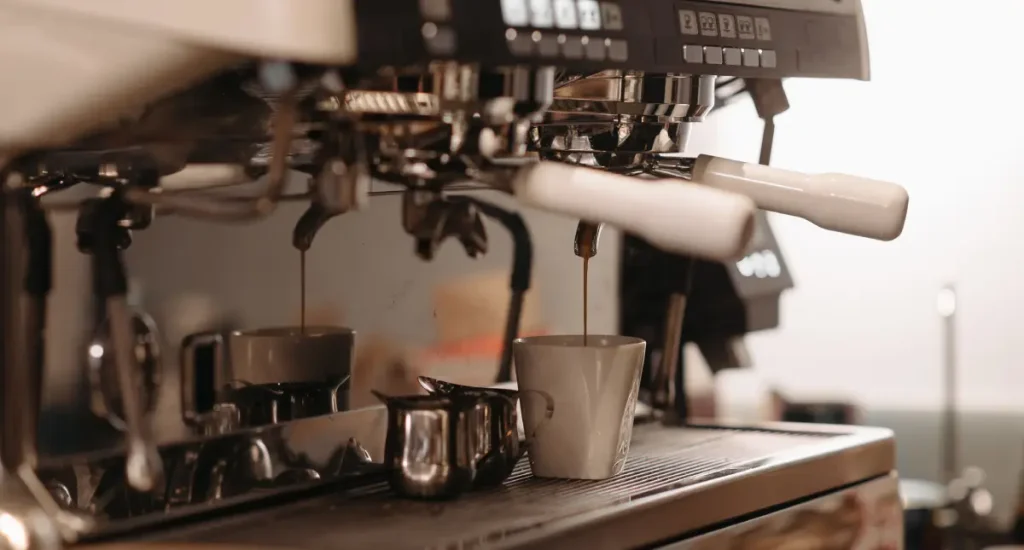 Heat Exchanger vs Double Boiler – What’s the Difference? ⚖️ 97 Close-up of an espresso machine, representing heat exchanger and double boiler systems