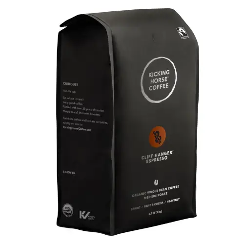 Kicking Horse Cliff Hanger Medium Roast Whole Bean Coffee Bag of Kicking Horse Cliff Hanger medium roast whole bean coffee with mountain-inspired packaging