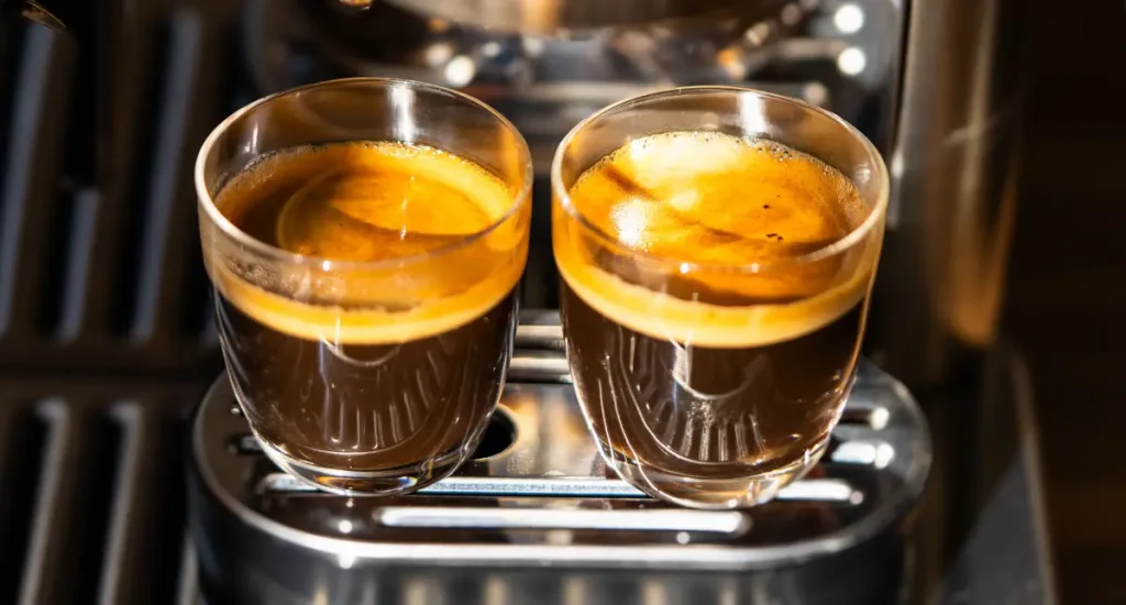 Triple Shot Espresso: Caffeine & Taste Guide 4 Two rich and bold triple shot espresso, showcasing its thick golden crema—perfect for a powerful caffeine boost.