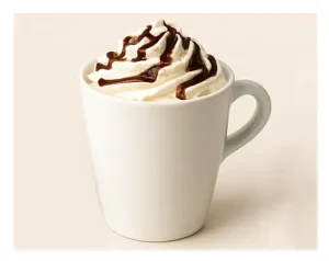 How to Make Café-Style Drinks at Home (Beginner Guide) 7 A mocha coffee drink with chocolate swirls and whipped cream and chocolate syrup topping.