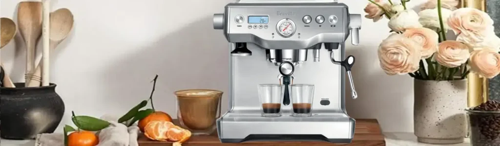 Breville Barista Touch Review: Is It Worth the Hype? ☕✨ 127 Breville Barista Touch espresso machine on a modern kitchen bench with coffee cup beside it
