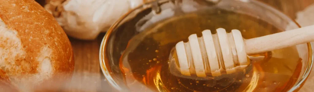 🍯 Honey Coffee Drinks: Sweet & Natural Recipes for Home Baristas 101 Bowl of honey on a table, perfect for sweetening homemade coffee drinks