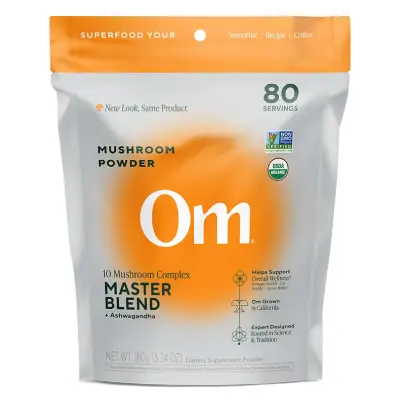 Om Mushroom Superfood Coffee – Functional Mushroom Coffee for Focus & Energy Om Mushroom Superfood Coffee served in a ceramic mug with packaging