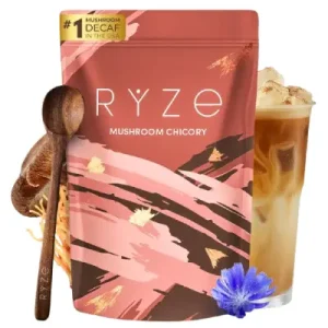 Ryze Chicory Coffee vs Coffee: What's the Difference? 5 Ryze Chicory mushroom coffee blend pouch in front of an iced cup of creamy chicory coffee comparing Ryze Chicory Coffee vs Coffee