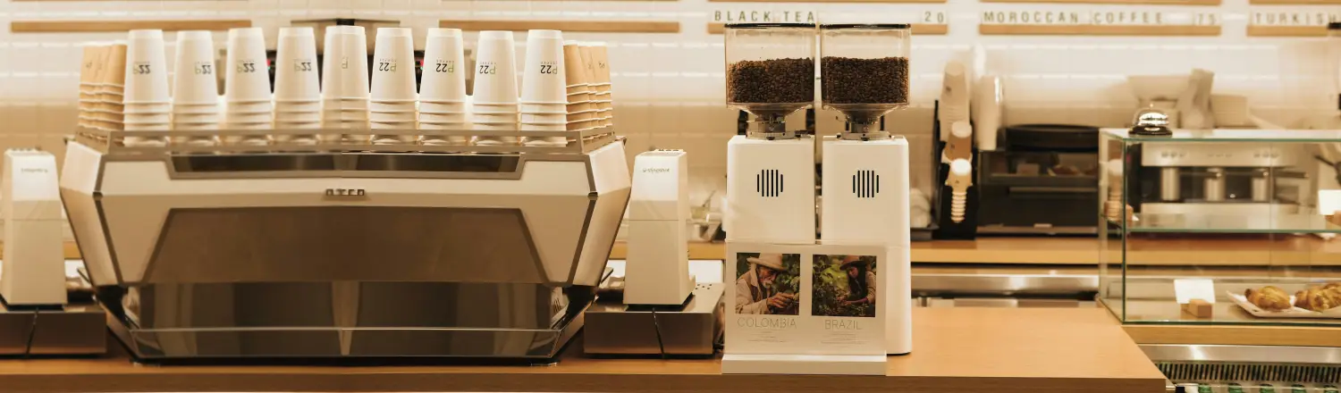 Blade vs Burr Grinders: What’s the Real Difference? ☕⚡ 2 Blade grinder and burr grinder side by side on a home coffee bar for comparison