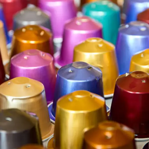 Pods for Nespresso Machines Coffee pods compatible with Nespresso machines displayed beside espresso cups