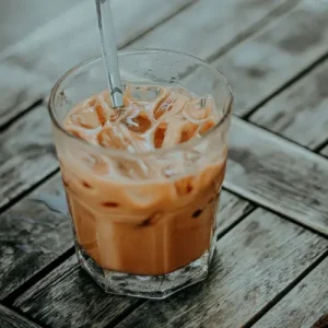 Iced Coffee vs Cold Brew: What’s the Real Difference? 4 A Glass of refreshing Iced Coffee with ice and straw