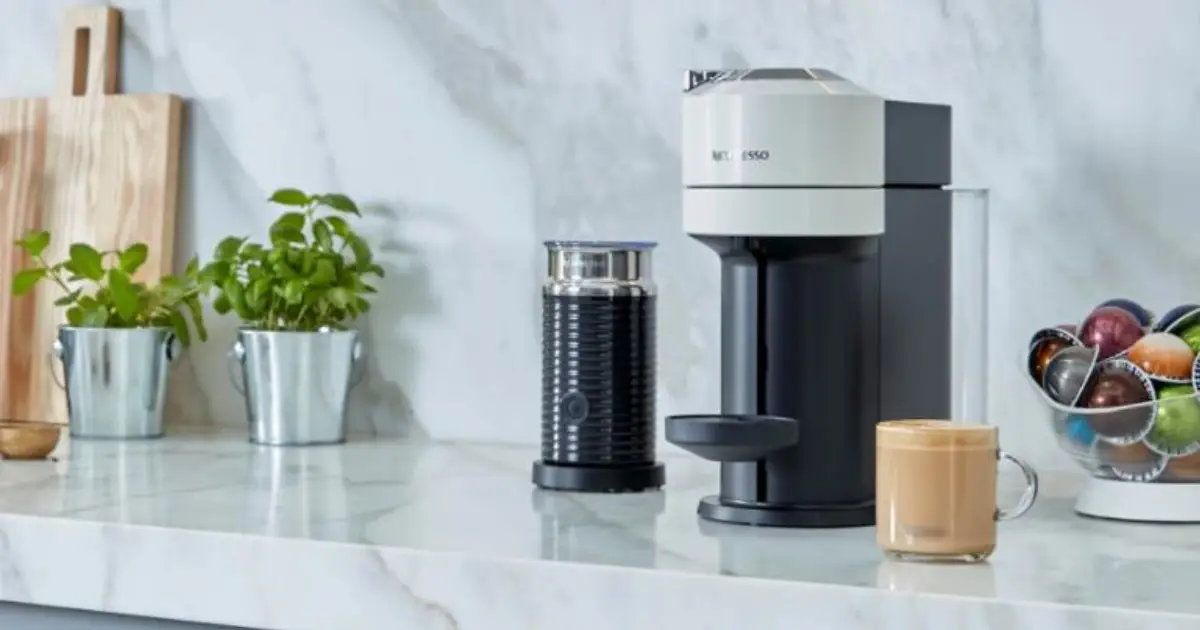 Nespresso Vertuo Next Review (2026): Is It Still Worth Buying? 2 Nespresso Vertuo Next coffee machine review showing the compact capsule coffee maker with a fresh cup of coffee, features, pros and cons, and buying advice.