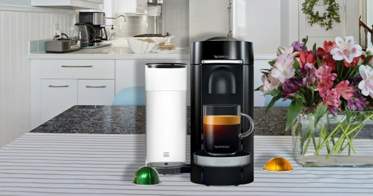 Nespresso Vertuo Plus Review (2026): Is It Still the Best Vertuo Machine? 2 The Nespresso Vertuo Plus Review showing the espresso machine on a kitchen counter brewing a cup of coffee