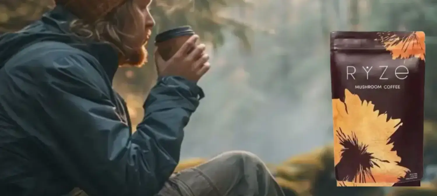 Ryze Taste Review: What Does Ryze Really Taste Like? 2 Man sitting outdoors enjoying a cup of Ryze Mushroom Coffee showing him doing a Ryze Taste Review of the coffee.