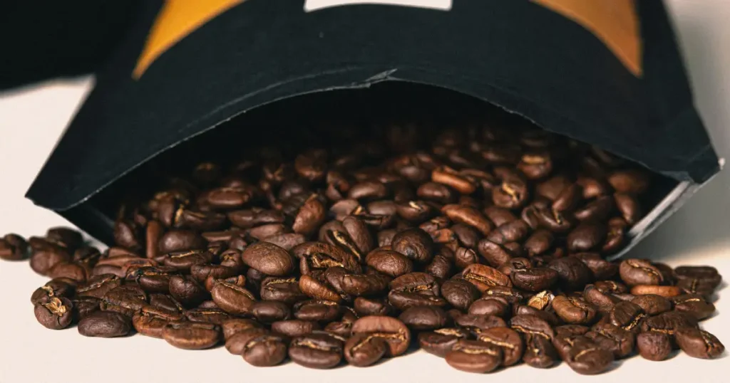 How Fresh Should Coffee Beans Be for Espresso? (2026 Guide) 8 Freshly roasted espresso coffee beans in newly opened package.